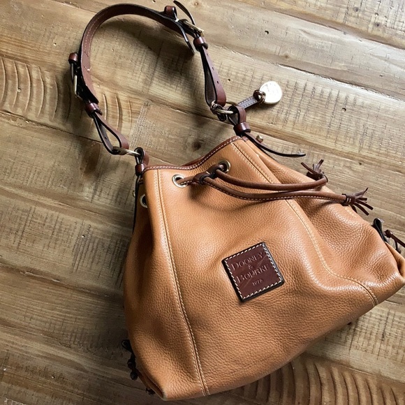 Dooney & Bourke Handbags - Vintage ✨ Dooney & Bourke leather bucket bag